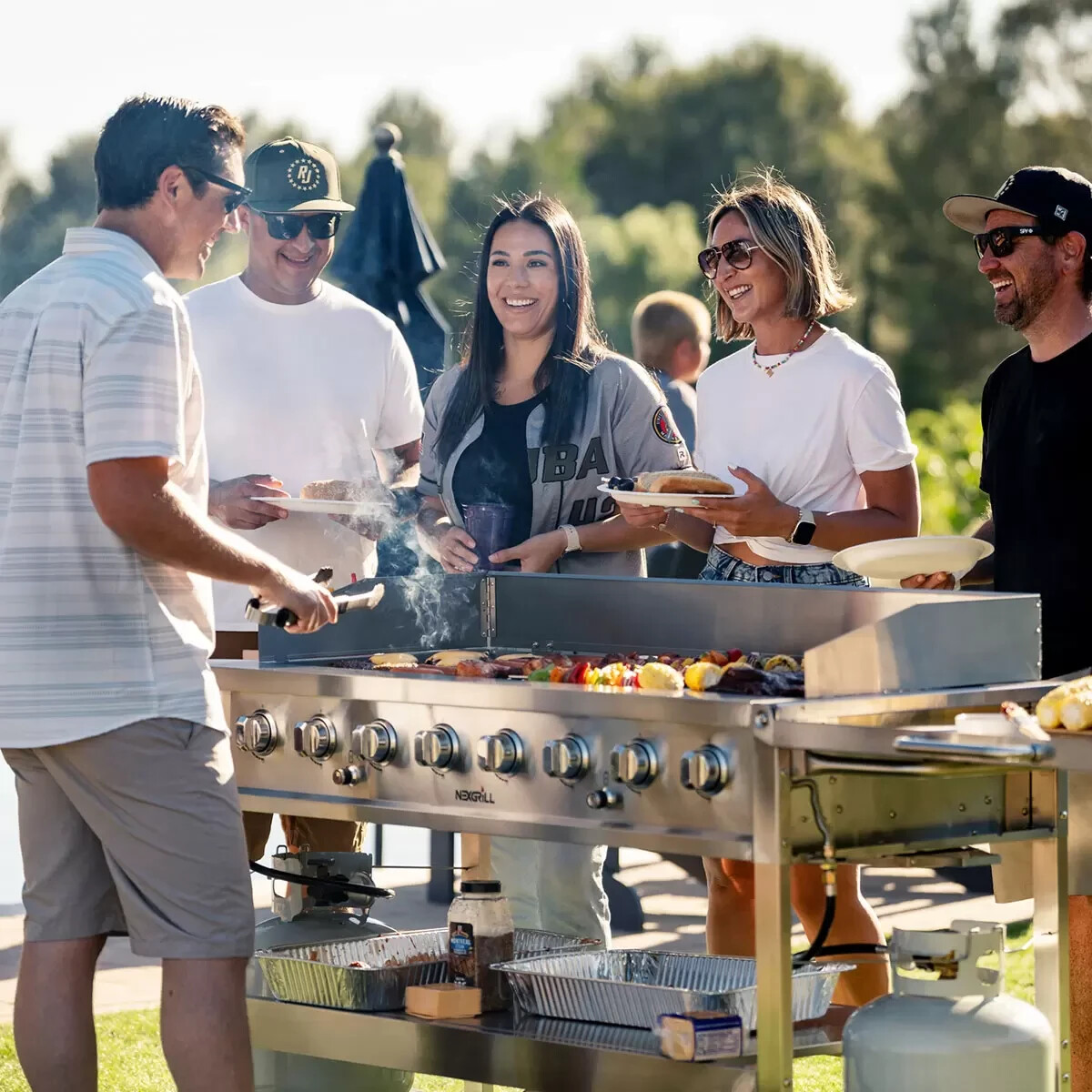 Guests enjoying BBQ at a Toronto event rental